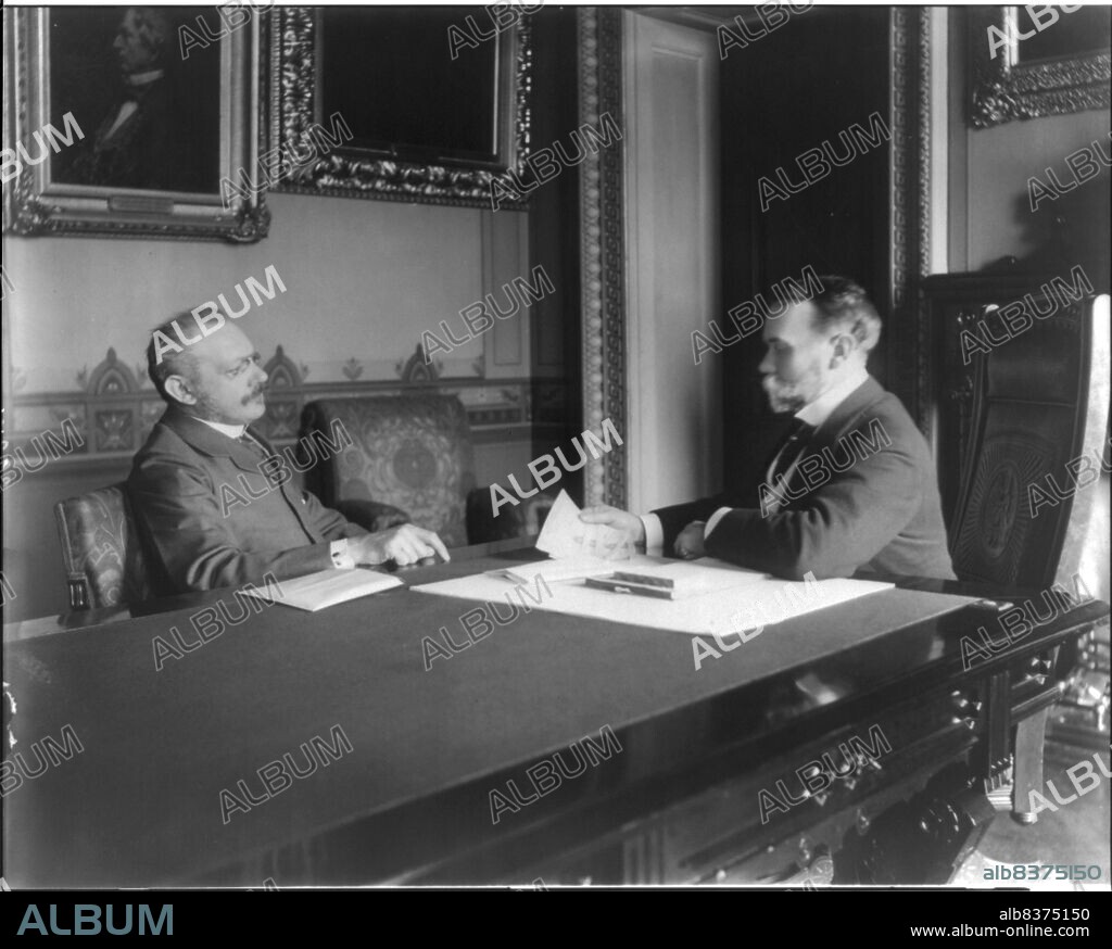 Jules Martin Cambron, 1845-1935, and John Milton Hay, 1838-1905, at exchange of our payment to Spain of 20 million for Philippine Islands, c1899 May 4.