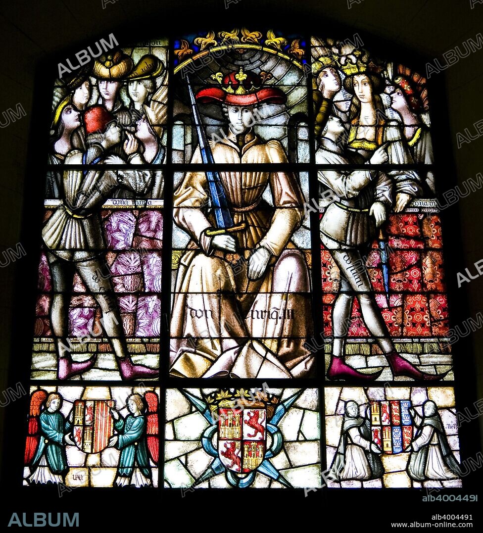 The Galley Chamber (Sala de la Galera) in the Alcazar of Segovia, Segovia, Spain, 2007. Queen Catherine of Lancaster had this room built in 1412. This stained glass window was made by Carlos Munoz de Pablos in the 20th century. It has a triptych shape and shows the image of Enrique III and his family. The Alcazar of Segovia was originally built as an Arab fortress, probably in the 12th century. The majority of the current building was constructed during the Middle Ages and the palace was extended on a large scale. The Alcazar's profile resembles an imaginary ship rising above the confluence of the Eresma and Clamores Rivers. It is preceded by beautiful gardens with statues of Daoiz and Velarde, heroes of the War of Independence. The Old Town of Segovia was declared a World Heritage Site by UNESCO in 1985.