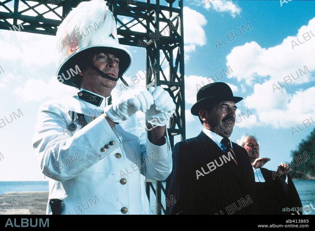 LEONARD ROSSITER and MICHAEL CAINE in WATER, 1985, directed by DICK CLEMENT. Copyright HANDMADE FILMS.