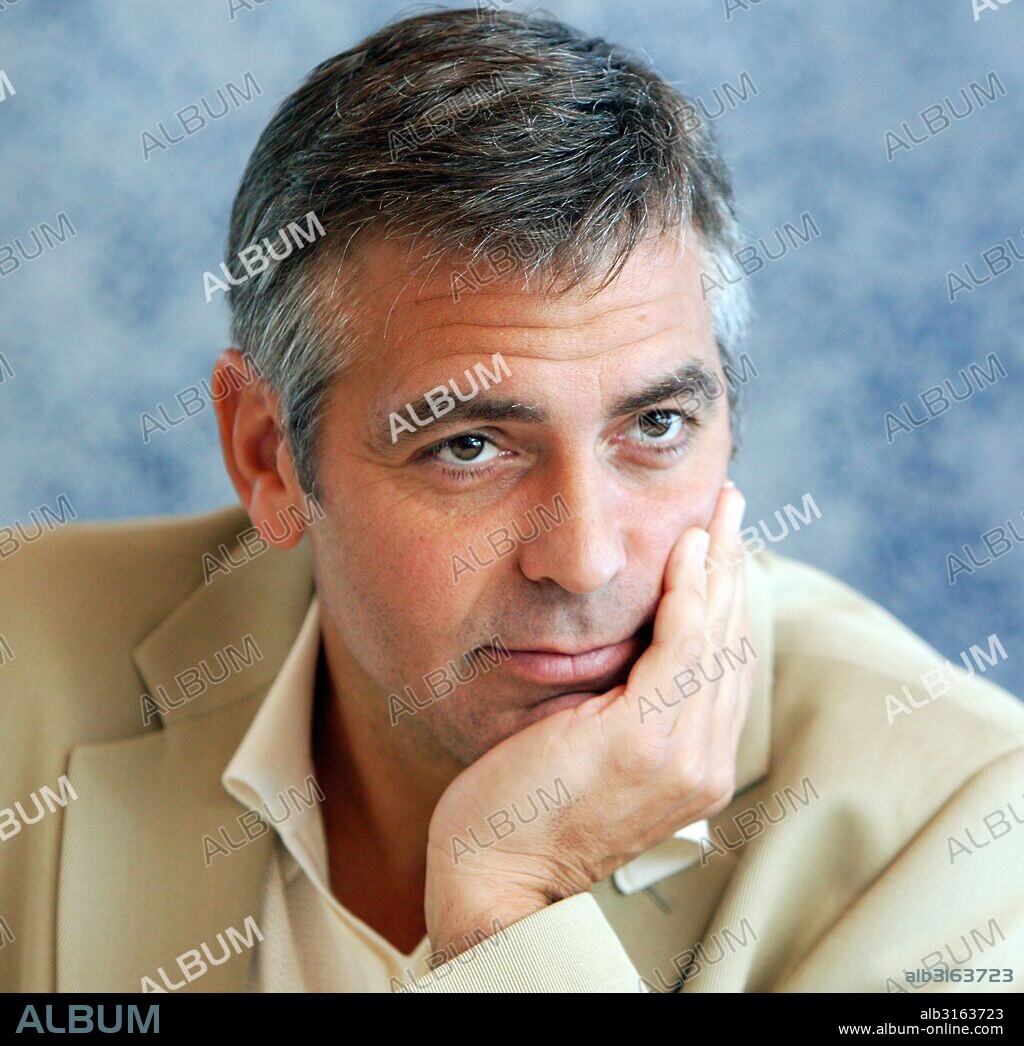 GEORGE CLOONEY. November 19, 2004 - U.S. - George Clooney photographed at Big Horn Golf Course in Palm Springs, CA. November 19, 2004. 19/11/2004