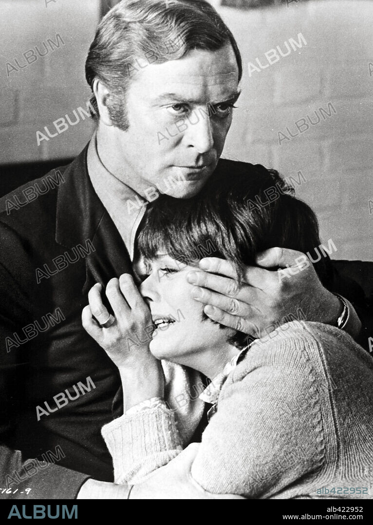 JANET SUZMAN and MICHAEL CAINE in THE BLACK WINDMILL, 1974, directed by DON SIEGEL. Copyright UNIVERSAL PICTURES.