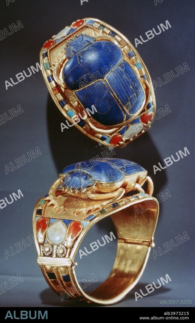 Scarab bracelet from Tutankhamun's tomb, 14th century BC. The tomb of the 18th Dynasty Ancient Egyptian Pharaoh Tutankhamun (reigned 1333-1323 BC) was discovered in 1922 by the British archaeologist Howard Carter. Uniquely amongst Egyptian royal tombs, its contents were intact. From the collection of the Egyptian National Museum, Cairo, Egypt.