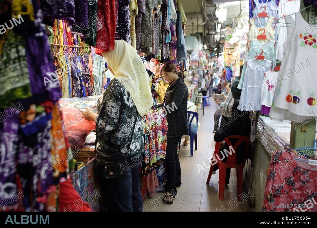 Clothing stalls in a Muslim market in Hat Yai, Southern Thailand *** Local Caption ***.