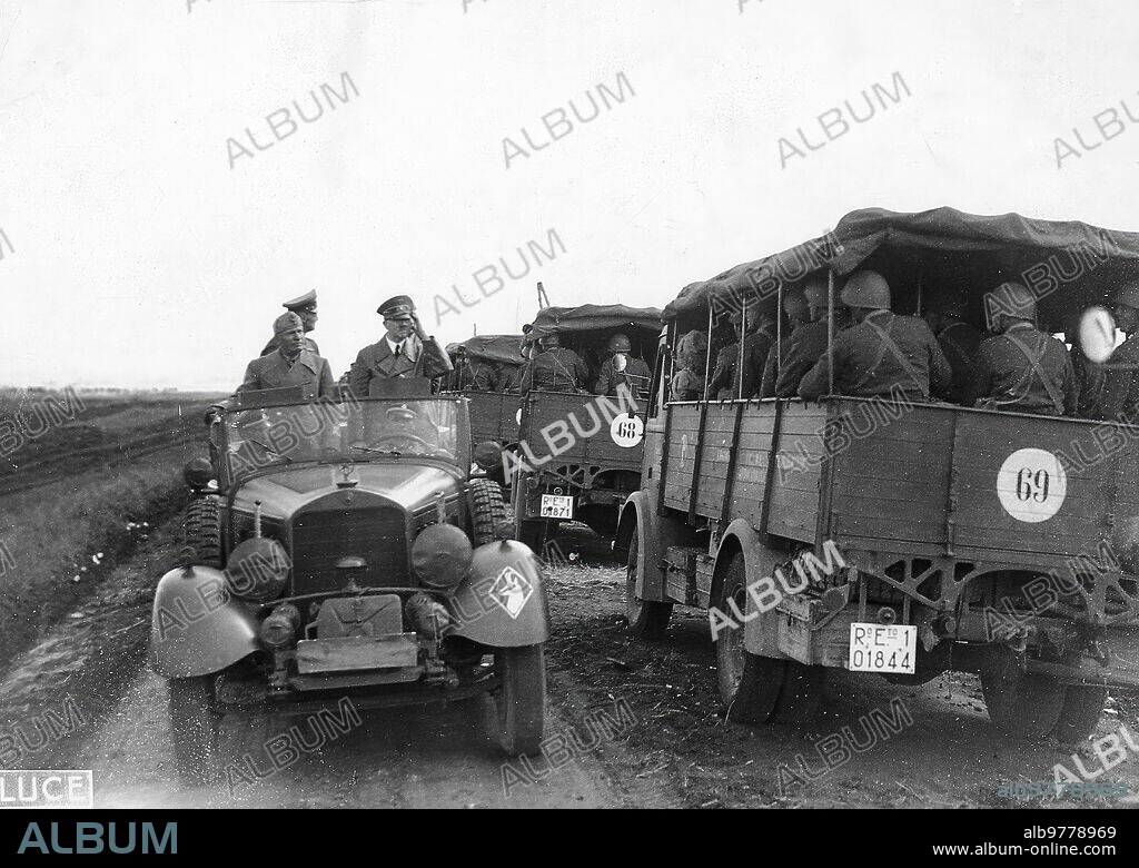 Russia. 1941. Eastern Front: Duce Benito Mussolini and Führer Adolf Hitler meet a motorized column of the Italian Expeditionary Corps in Russia.