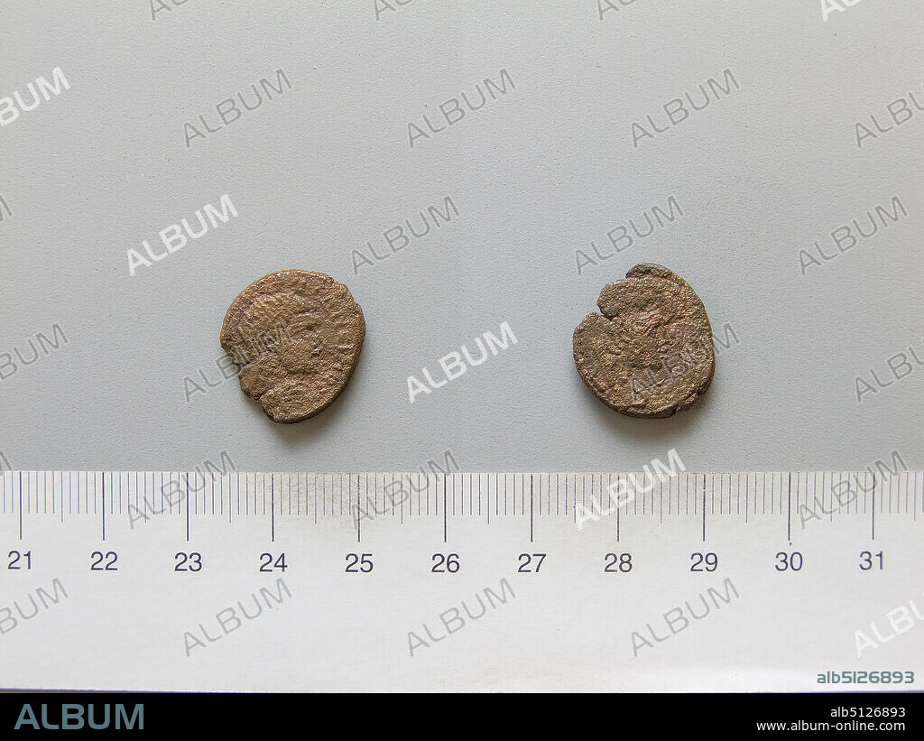 Ruler: Caracalla, Roman Emperor, A.D. 188217, ruled A.D. 198217, Mint: Edessa, Mesopotamia, Coin of Caracalla, Roman Emperor from Edessa, A.D. 21117, Copper, 2.75 g, 7:00, 16.6 mm, Excavated in Dura-Europos, Made in Edessa, Mesopotamia, Roman, 2nd3rd century A.D., Numismatics.