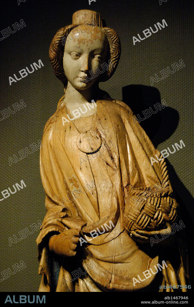 CATALINA DE ALEJANDRIA, Santa (m.305). Mártir cristiana de Alejandría. Escultura de 1410-1420. Galería Nacional Húngara. Budapest. Hungría.