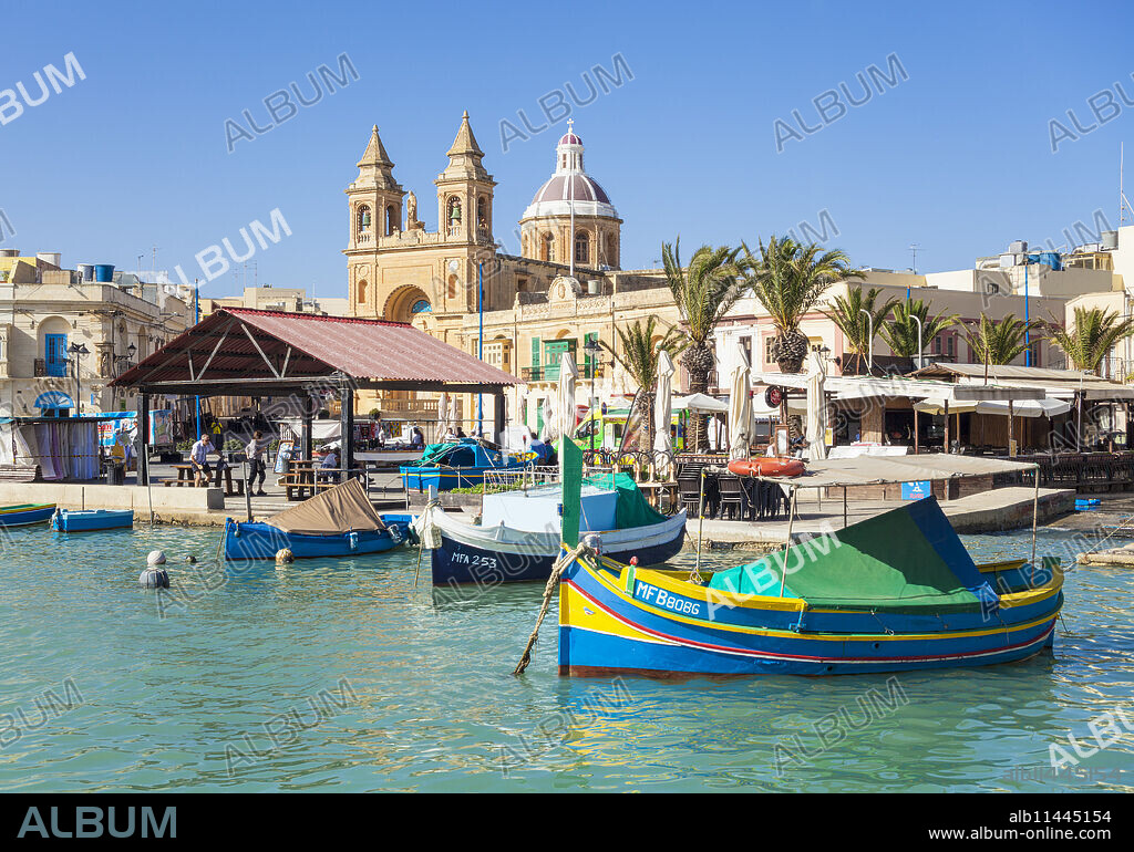 Marsaxlokk Harbour, Our Lady of Pompeii Church and traditional fishing boats, Marsaxlokk, Malta, Mediterranean, Europe.