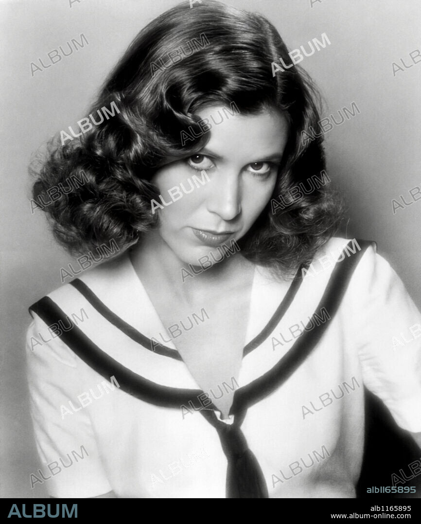 CARRIE FISHER in UNDER THE RAINBOW, 1981, directed by STEVE RASH. Copyright ORION PICTURES.