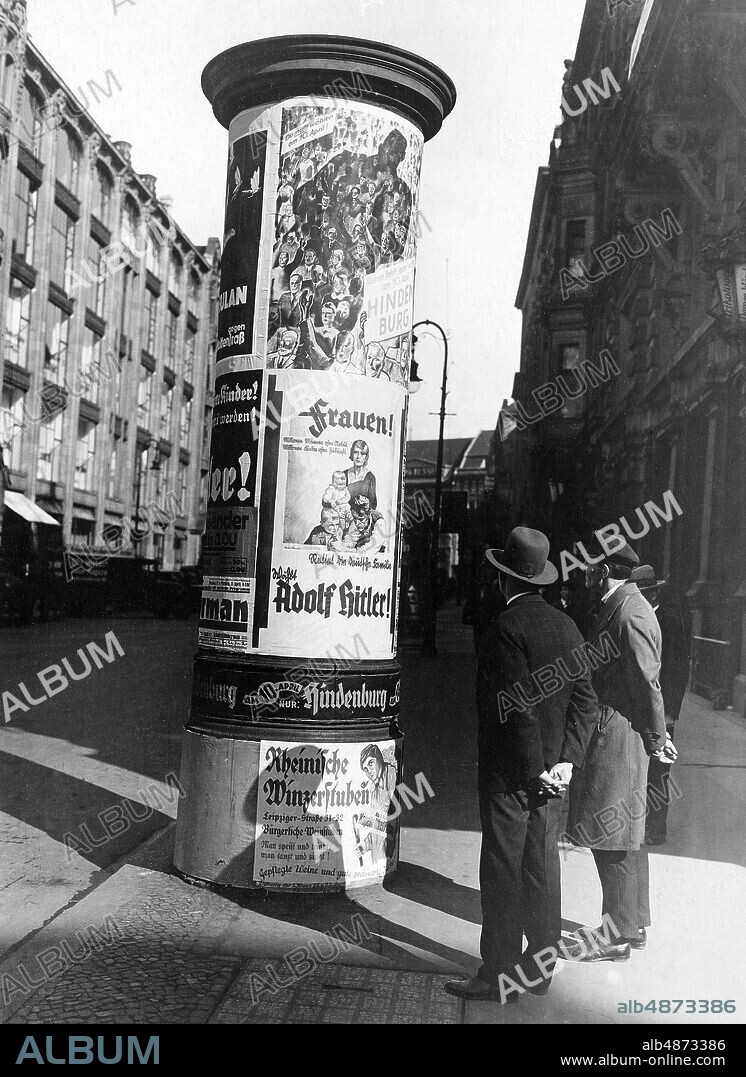 GERMANY BERLIN 1932. Orig. caption ... FOR PRESIDENTIAL REPRESENTATIVE ELECTION 33961 Elected Hindenburg - Elected Adolf Hitler - calls it from the Berlin Litfas pillars. Photo: Phototek / AB Text & Bilder / SVT / Code: 5600 Folder: Germany Presidential election 1932-03-13 Election propaganda: Nazis 4936 D Election campaigns Election posters sites: BERLIN; GERMANY PhotoDate: 1932 - ?? - ??.
