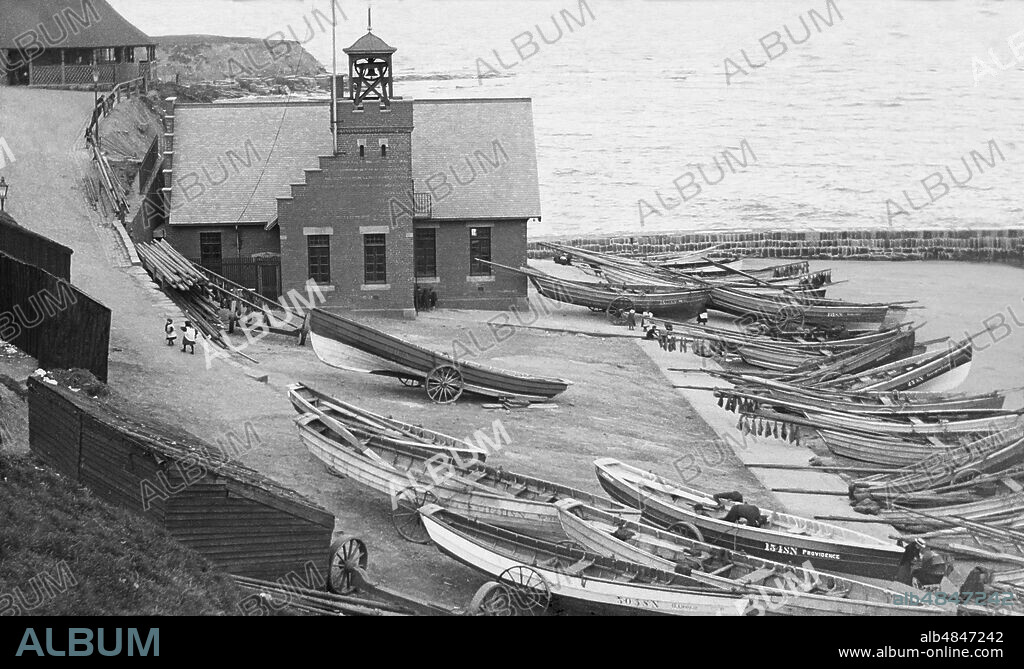 Negative circa 1900, Victorian era. Cullercoats Bay with coble fishing boats; Cullercoats, Tyne and Wear, England.