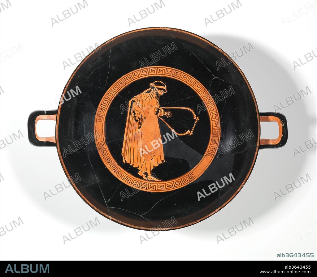 Terracotta kylix (drinking cup). Culture: Greek, Attic. Dimensions: H.: 3 13/16 in. (9.7 cm)
Diam.: 9 3/8 in. (23.8 cm). Date: ca. 480 B.C..
Interior, man playing lyre
Exterior, obverse and reverse, komasts (revelers)
The decoration of this cup depicts revelers in various moods and actions. On the interior, a pensive man is shown holding a lyre and a plektron (pick). The men and youths on the exterior appear with the paraphernalia of drinking and music, and one of them dances.