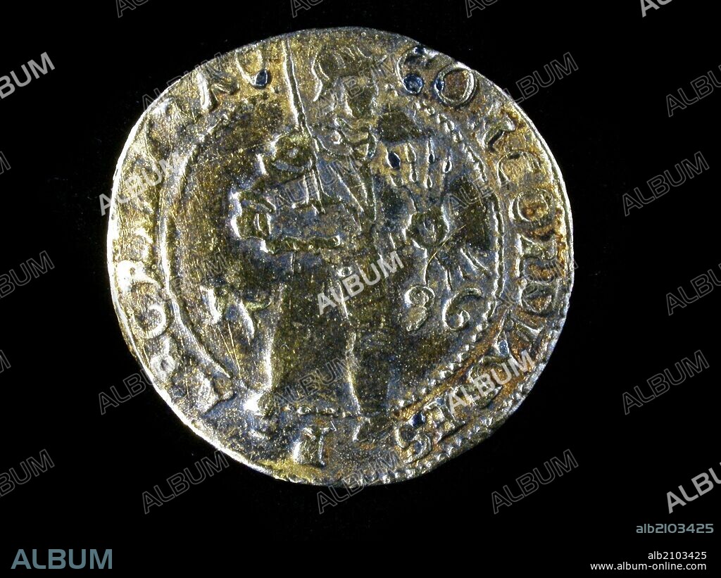 NUMISMATICA. MONEDA MODERNA. OBSIDIONAL DE ORO, DE FELIPE II. ANVERSO. FIGURA MASCULINA CON YELMO DE PIE MARCHANDO A LA DERECHA. (DEPOSITO: MUSEO ARQUEOLOGICO NACIONAL).