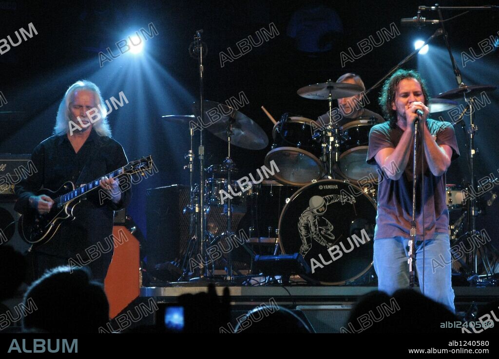 Oct 09, 2009 - San Diego, California, USA - Singer EDDIE VEDDER of the rock band Pearl Jam invited his former guitar teacher BUD WHITCOMB (L) to play a song with the band during a concert at Viejas Arena in San Diego. 09/10/2009
