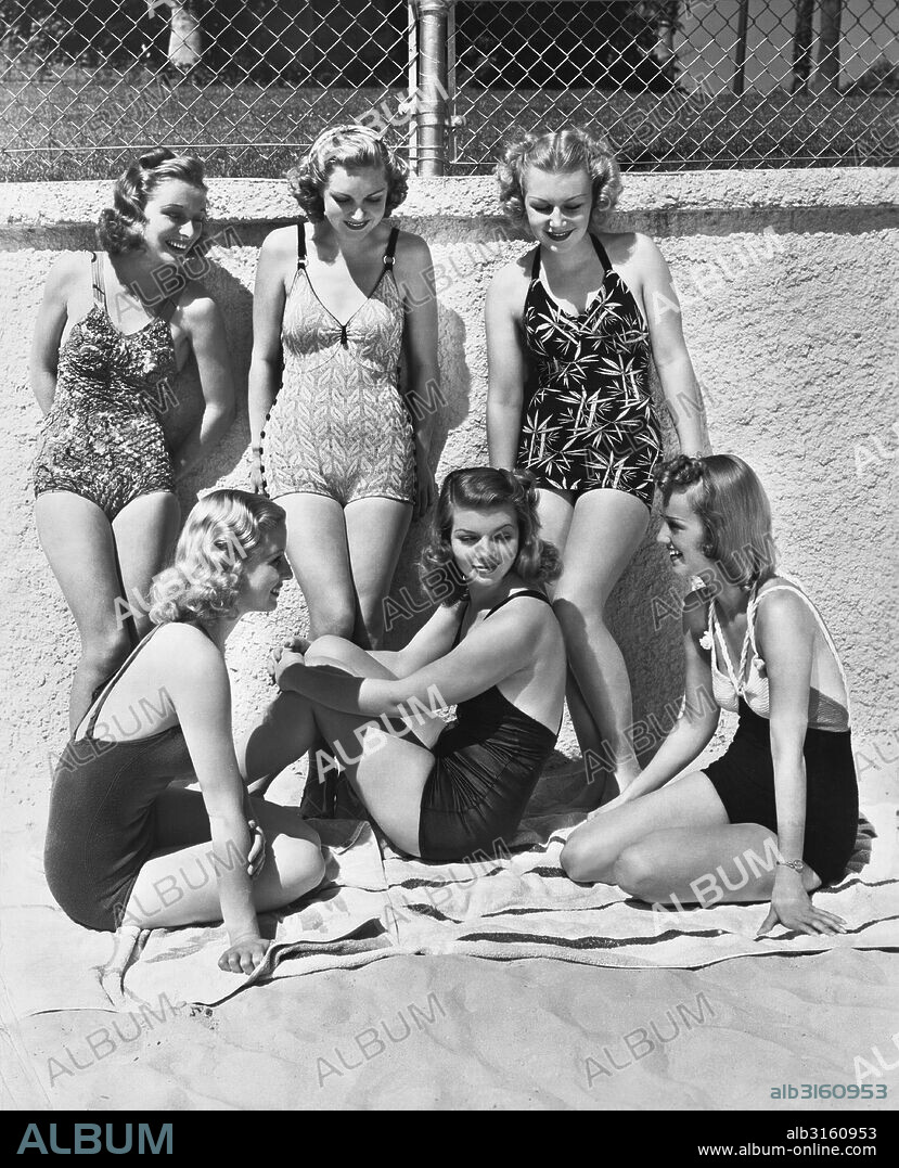 Malibu, California: 1938 These six lucky actresses have been told they must get suntans for their upcoming roles in 'Give Me a Sailor', so here they are doing their job on Malibu Beach. Standing L-R: Cheryl Walker, Ruth Rogers, and Harriett Haddon, seated L-R: Marion Weldon, Laurie Lane, and Dorothy White.
