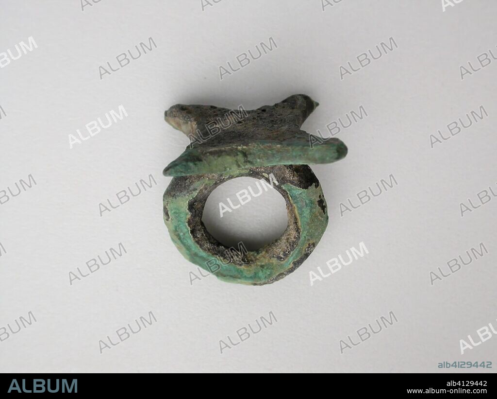 ANCIENT GREEK. Ring with Ingot Bezel. Greek; Thessaly. Date: 800 BC-700 BC. Dimensions: 2.9 × 2.7 × 2.7 cm (1 1/8 × 1 1/16 × 1 1/16 in.). Bronze. Origin: Thessaly.