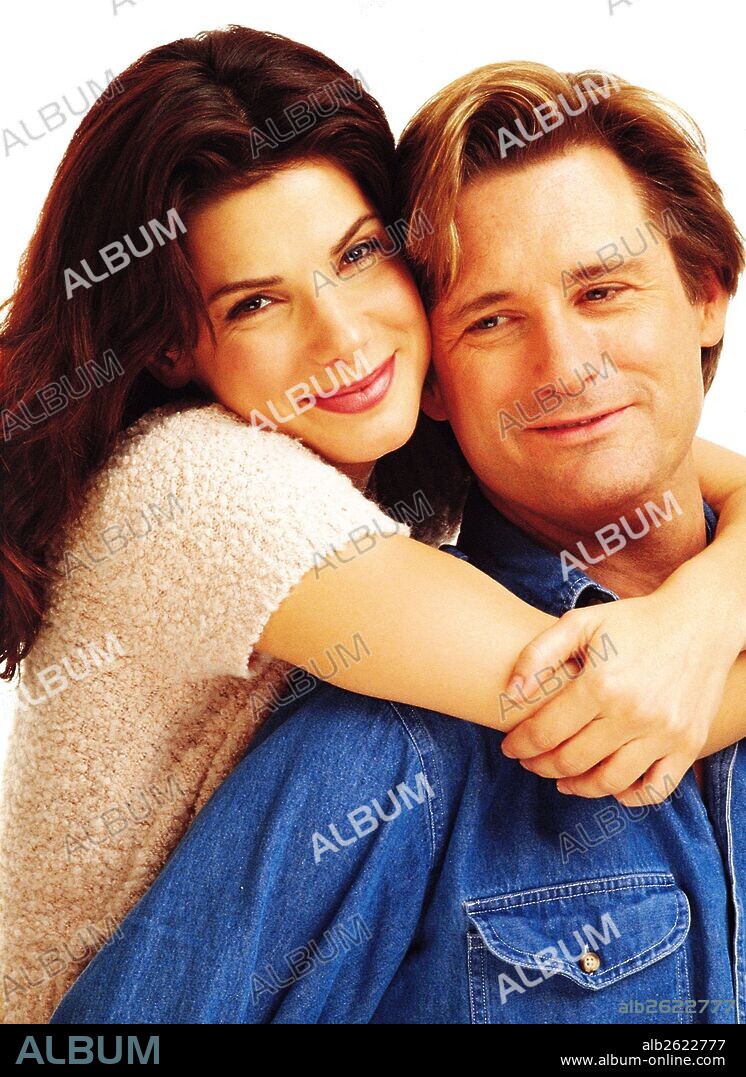BILL PULLMAN and SANDRA BULLOCK in WHILE YOU WERE SLEEPING, 1995, directed by JON TURTELTAUB. Copyright HOLLYWOOD PICTURES.