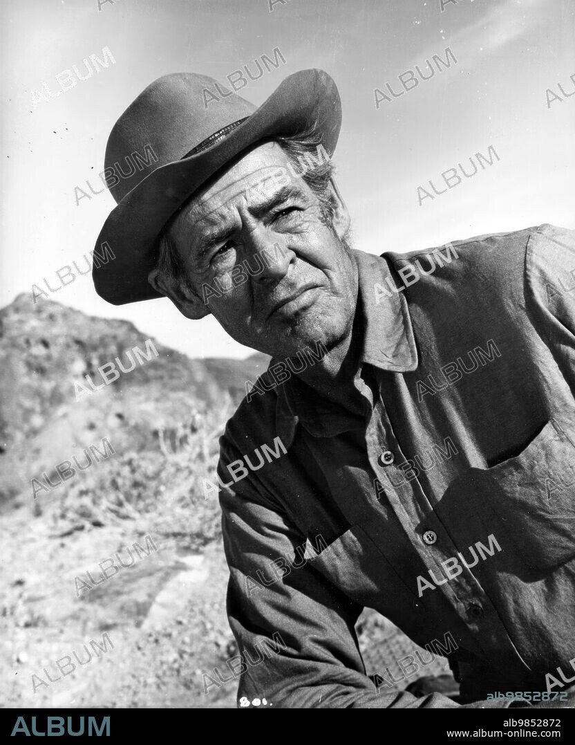 ROBERT RYAN in THE PROFESSIONALS, 1966, directed by RICHARD BROOKS. Copyright COLUMBIA PICTURES.