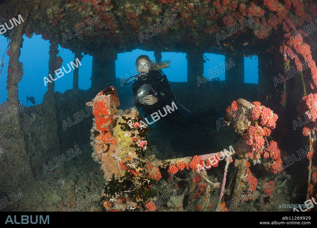 Diver inside Bridge of Maldive Victory Wreck, North Male Atoll, Maldives.