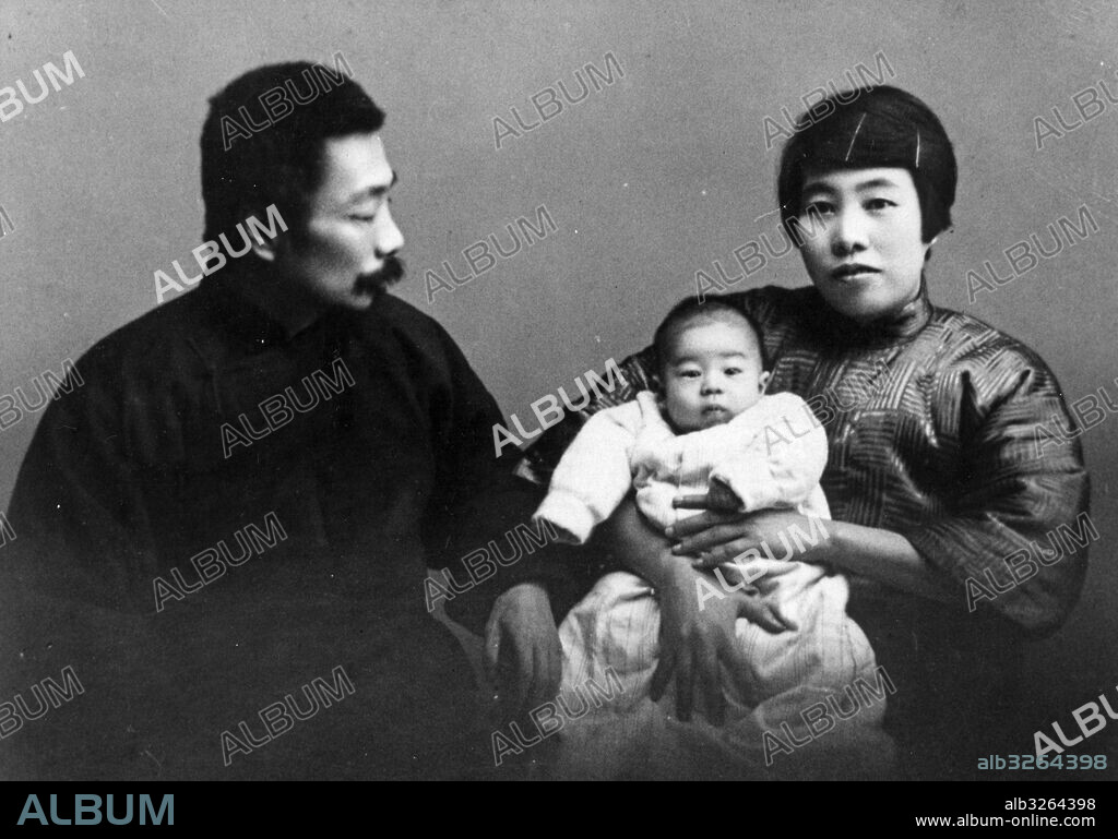 Writer, Lu Hsun (1881-1936) in a portrait with his wife Hsu Kwang-ping (Xu Guangping) and son Hai Ying. Shanghai, 1930.