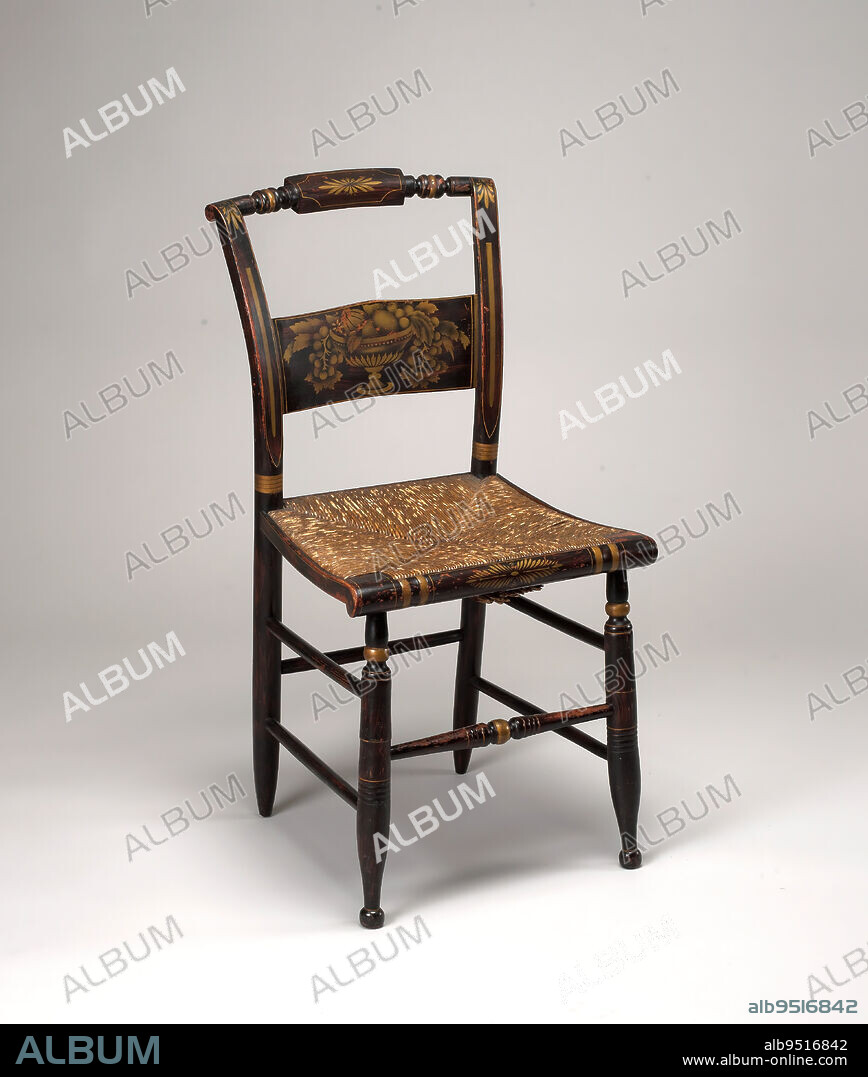 Side chair, c. 1825, Lambert Hitchcock, American, Hitchcocksville Riverton, Connecticut, est. 1818, 35-5/16 x 17-3/4 x 17 in. (89.7 x 45.1 x 43.2 cm), Wood, rush, pigment, United States, 19th century, Lambert Hitchcock has emerged as one of the most famous entrepreneurs in America through his chair manufactory, which he established in 1818 near Hartford, Connecticut. By the 1830s, Hitchcock annually sent upwards of 15,000 chairs to furniture retailers throughout New England and the South. He advertised his firm by stenciling his name on the back seat rail of chairs produced at his factory.