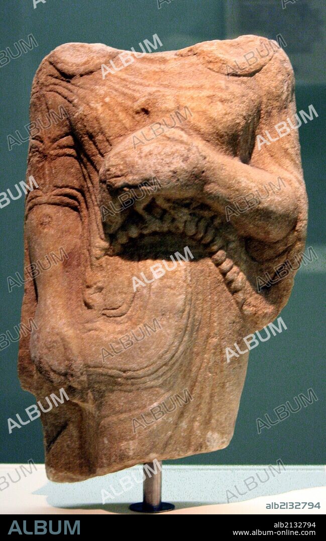 Kore (girl) holding a bird as an offering Marble, made in Ionia. From Theangela, Karia, made about 525-500BC. In Archaic Greek art the successful treatment of drapery was important in female statues, whereas the sculptors of male figures worked towards the ideal nude. This Kore wears a short- sleeved chiton (tunic) belted under the breasts, the material of which is pulled into shallow folds by the girl's right hand. Over this she has a himation (cloak) that falls over her back and is pinned at the shoulders. (Photo by: Universal History Archive/UIG via Getty Images).