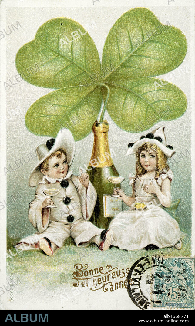PIERROT et COLOMBINE boivent du champagne sous un trefle a quatre feuilles. Carte postale de Bonne annee, vers 1905. Credit Collection DABECOM/KHARBINE-TAPABOR.