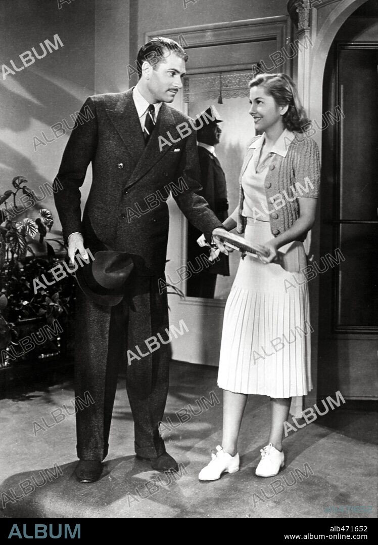 JOAN FONTAINE and Laurence Kerr Olivier. JOAN FONTAINE and LAURENCE OLIVIER in REBECCA, 1940, directed by ALFRED HITCHCOCK. Copyright Selznick International Pictures.