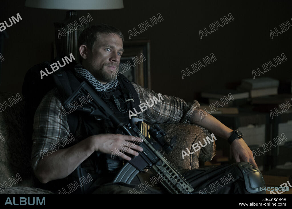 CHARLIE HUNNAM in TRIPLE FRONTIER, 2019, directed by J. C. CHANDOR. Copyright ACQUIRE TALENT AGENCY/ATLAS ENTERTAINMENT.
