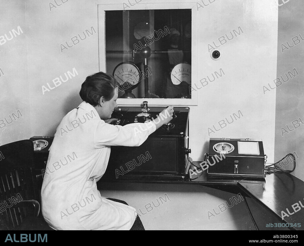 Photograph showing the control panel in the deep X-ray therapy department at the Marie Curie Hospital for Cancer and Allied Diseases, London, 1934. Founded by medical women for the "radiological treatment of women suffering from cancer and allied diseases," the hospital opened in 1929 with the encouragement of Marie Curie, who allowed her name to be used, and it was staffed entirely by women.