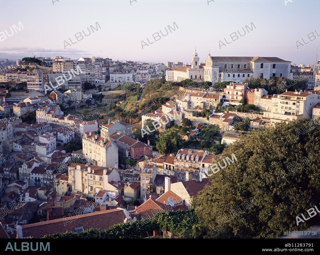 Evening, Largo de Graca area of the city from Castelo de Sao Jorge, Lisbon, Portugal, Europe.