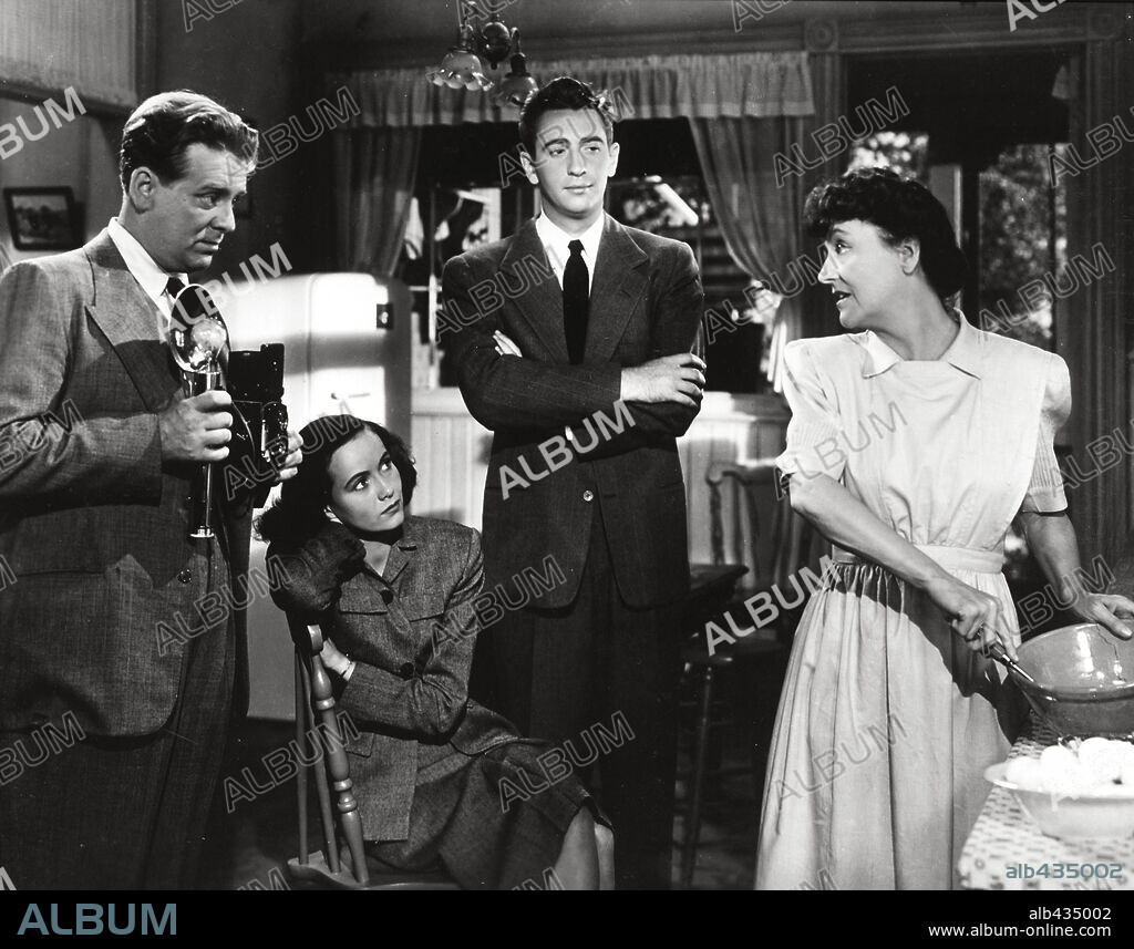 MACDONALD CAREY, PATRICIA COLLINGE, TERESA WRIGHT and WALLACE FORD in SHADOW OF A DOUBT, 1943, directed by ALFRED HITCHCOCK. Copyright UNIVERSAL PICTURES.