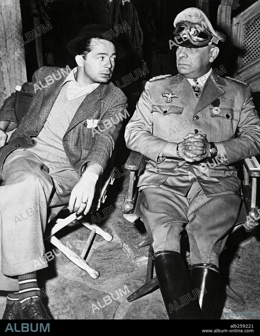 BILLY WILDER and ERICH VON STROHEIM in FIVE GRAVES TO CAIRO, 1943, directed by BILLY WILDER. Copyright PARAMOUNT PICTURES.