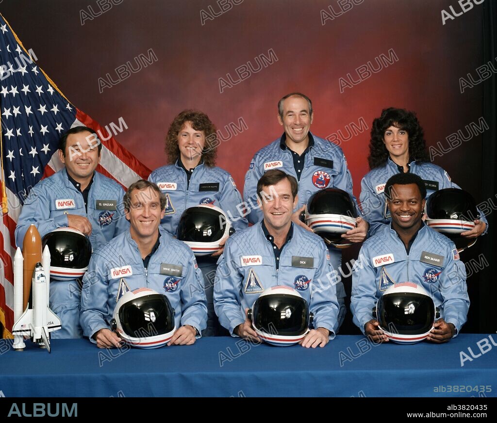 Five astronauts and two payload specialists make up the crew, scheduled to fly aboard the space shuttle Challenger in January of 1986. Crew members are (left to right, front row) astronauts Michael J. Smith, Francis R. (Dick) Scobee and Ronald E. McNair; Ellison S. Onizuka, Sharon Christa McAuliffe, Gregory Jarvis and Judith A. Resnik. McAuliffe and Jarvis are payload specialists, representing the Teacher in Space Project and Hughes Company, respectively. The Space Shuttle Challenger disaster occurred on January 28, 1986, when the NASA Space Shuttle orbiter Challenger (OV-099) (mission STS-51-L) broke apart 73 seconds into its flight, leading to the deaths of its seven crew members, which included five NASA astronauts and two Payload Specialists. The spacecraft disintegrated over the Atlantic Ocean, off the coast of Cape Canaveral, Florida at 11:39 EST (16:39 UTC). Disintegration of the vehicle began after an O-ring seal in its right solid rocket booster (SRB) failed at liftoff. The O-ring failure caused a breach in the SRB joint it sealed, allowing pressurized burning gas from within the solid rocket motor to reach the outside and impinge upon the adjacent SRB aft field joint attachment hardware and external fuel tank. This led to the separation of the right-hand SRB's aft field joint attachment and the structural failure of the external tank. Aerodynamic forces broke up the orbiter.