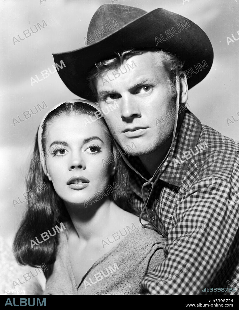 NATALIE WOOD and TAB HUNTER in THE BURNING HILLS, 1956. Copyright WARNER BROTHERS.