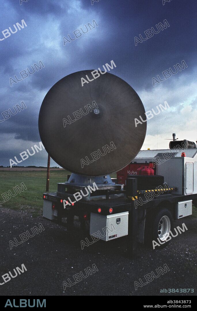 Close-up of Doppler on Wheels portable weather radar truck (also called DOW) scanning a severe thunderstorm in Oklahoma.