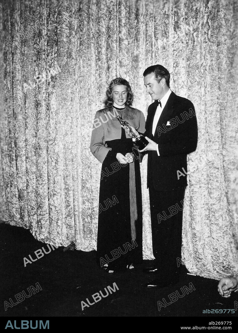 INGRID BERGMAN y RAY MILLAND. 18ª Edición de los Premios Oscar (1946). Ray Milland premiado como mejor actor por "Días sin huella". Le acompaña la actriz Ingrid Bergman. 1946