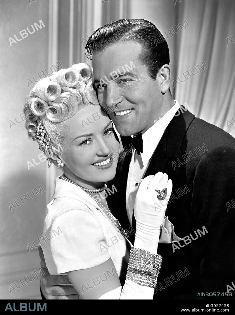BETTY GRABLE and JOHN PAYNE in THE DOLLY SISTERS, 1945, directed by IRVING CUMMINGS. Copyright 20TH CENTURY FOX.