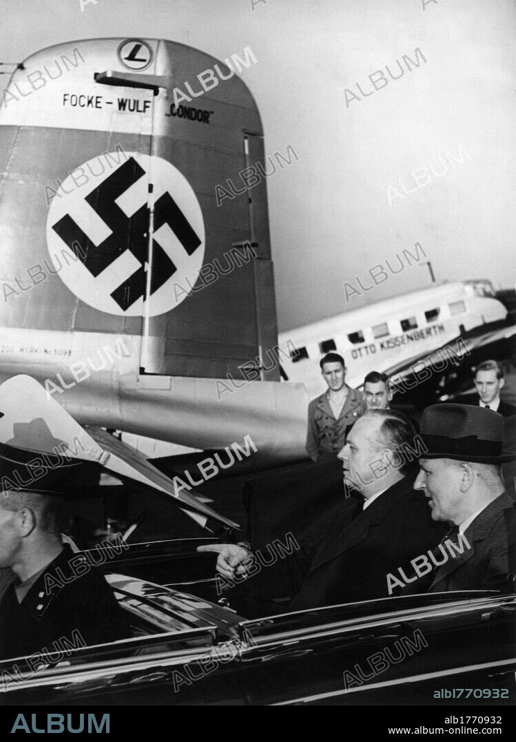 Joachim von Ribbentrop leaving for Moscow. The German Foreign Minister Joachim von Ribbentrop, with one of his advisers, arriving by car at the airport to leave for Moscow. Salzburg, 22nd August 1939.