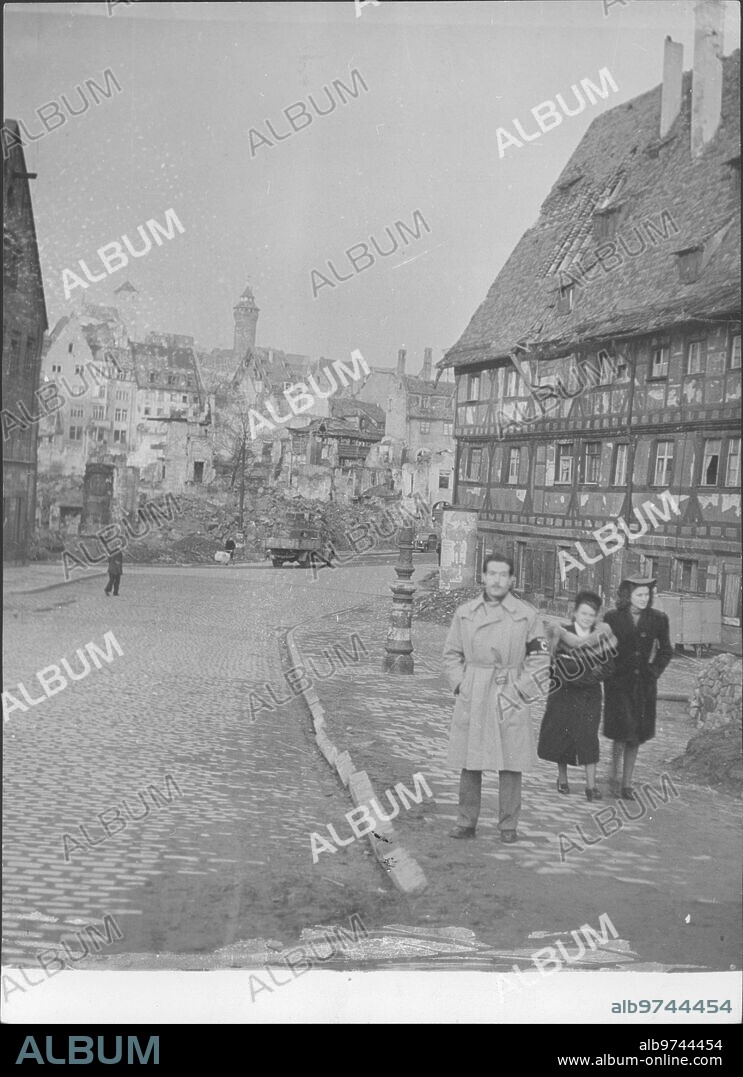 1946. Carlos Sentis poses in front of the Ruins of the German city of Nuremberg, where he was a correspondent for the newspaper Abc in the Trials that took place there against the Nazi War Criminals.