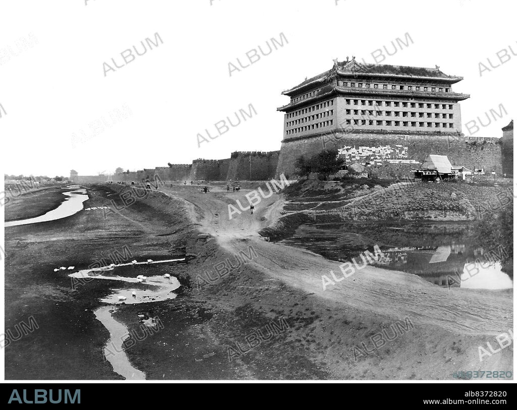 The Beijing city wall was a series of fortifications built between the early 1400s and 1553. The Inner city wall was 24 km long and 15 meters high, with a thickness of 20 metres at ground level and 12 metres at the top. It had nine gates. This wall stood for nearly 530 years, but in 1965 it was removed to allow construction of the 2nd Ring Road and the Line 2, Beijing Subway.<br/><br/>. Only one part of the wall is extant, in the southeast, just south of Beijing Railway Station. The Outer city walls had a perimeter of approximately 28 kilometres. The entire enclosure of the Inner and Outer cities had a perimeter of nearly 60 kilometres.