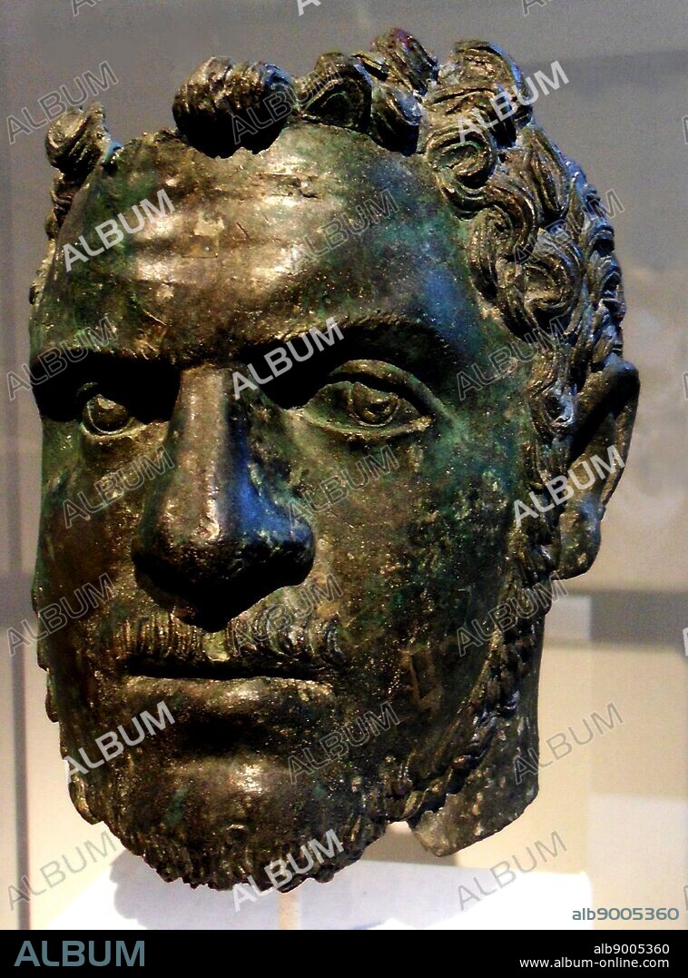 Fragmentary bronze portrait of the emperor Caracalla. Roman, Severan, ca A.D. 212-217.