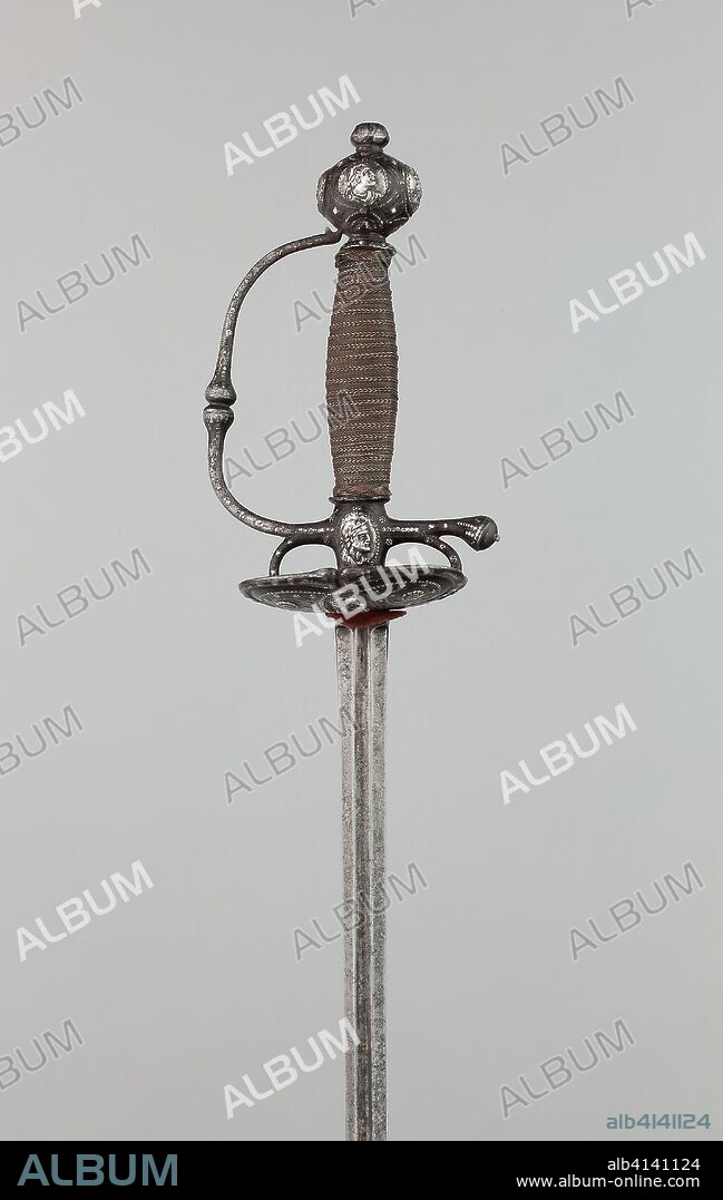Transitional Rapier. Northern European, probably English. Date: 1650-1670. Dimensions: Overall L. 108.5 cm (42 3/4 in.)
Blade L. 91.5 cm (36 in.)
Wt. 1 lb. 4 oz. Steel, iron, silver, copper, wood. Origin: Europe, northern.