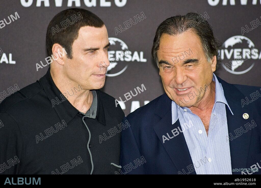 OLIVER STONE and TRAVOLTA JOHN. Sept. 17, 2012 - Berlin, Berlin, Germany - John Travolta and Oliver Stone attends the ''Savages'' photocall at Hotel Adlon, Berlin. 17/09/2012