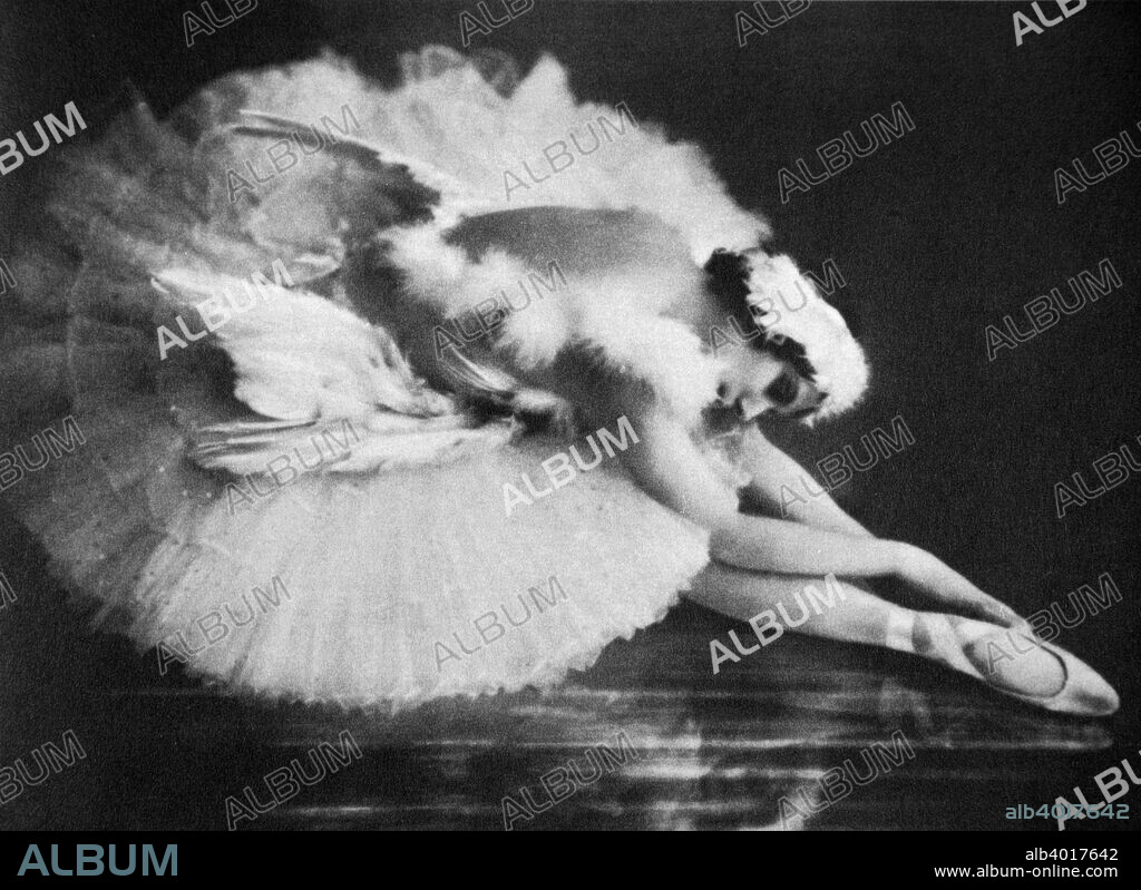 Anna Pavlova, Russian ballerina, in 'The Swan', early 20th century. Pavlova (1881-1931) was the most famous classical ballerina of her era. She trained at the school of the Imperial Ballet, made her debut as soloist in 1899, and became prima ballerina of the company in 1906. Pavlova toured Europe in 1907, appeared briefly with the Ballets Russes of the Russian impresario Sergey Diaghilev and, in 1910 made her American debut with the Russian dancer Mikhail Mordkin at the Metropolitan Opera House in New York City. She founded her own company in 1911, and until 1931, when she died of pneumonia while on tour, she danced extensively in Europe, the Americas, Africa, and Asia, often bringing ballet for the first time to remote areas. Her most famous classical roles were in 'Giselle', 'Swan Lake', 'Les Sylphides', 'Don Quixote', 'Coppélia', and in the solo dance 'The Dying Swan', created for her in 1905 by the Russian choreographer Michel Fokine.