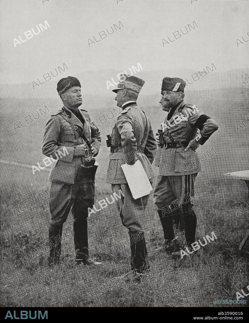 Benito Mussolini (1883-1945), leader of the National Fascist Party, left, general Giuseppe Vaccari (1866-1937), center, and Attilio Teruzzi (1882-1950), right, watch the Camicie Nere (Blackshirts) practicing in the vicinity of Mentana, Italy, photo by Istituto Luce, from L'Illustrazione Italiana, year LVII, n 38, September 21, 1930.