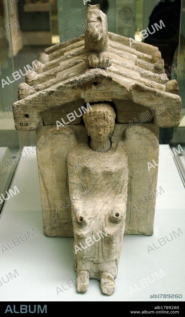 Etruscan cinerary urn in shaped of house or temple. On the roof there are two panthers and in the front a winged female figure. 425-350 BC. Limestone. From Chiusi. British Museum. London. England. United Kingdom.