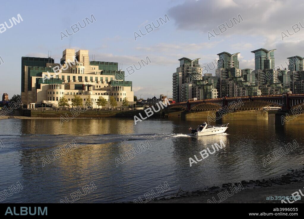 The SIS Building from across the River Thames, London. Designed by architect Terry Farrell, this building has been the headquarters of MI6 since its completion in 1994. It has been nicknamed 'Babylon-on-Thames' because of its perceived resemblance to a Babylonian ziggurat. Vauxhall Bridge is on the right.