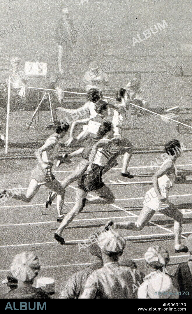 Photograph of Mildred Ella "Babe" Didrikson Zaharias (1911 - 1956) winning the 80m Hurdles at the 1932 Olympic games. Babe gained world fame in track and field and All-American status in basketball.