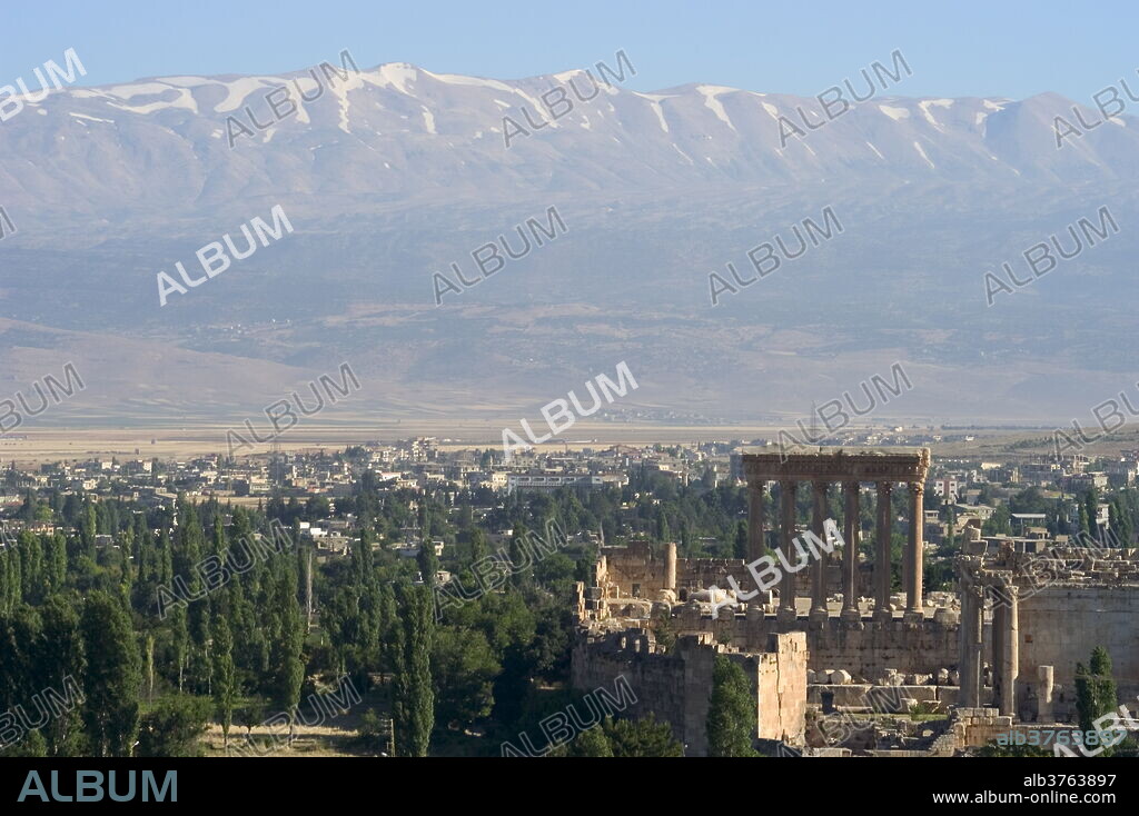 Snow capped mountains of the Anti-Lebanon Range behind the Roman archaeological site, Baalbek, UNESCO World Heritage Site, The Bekaa Valley, Lebanon, Middle East.
