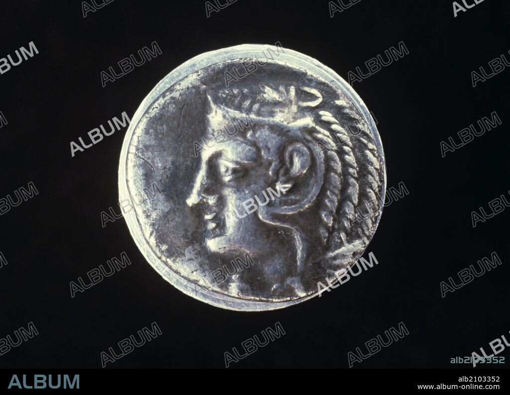 NUMISMATICA.MONEDA PUNICA. DRACMA DE PLATA. ANVERSO. CABEZA DE HERCULES CUBIERTA POR PIEL DE LEON A LA DERECHA.238 A.C. (DEPOSITO: MUSEO ARQUEOLOGICO NACIONAL).